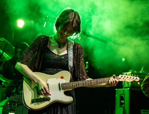 Guitarist performing on stage